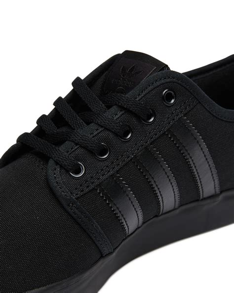 zwarte sneakers winter adidas|Adidas black shoes on sale.